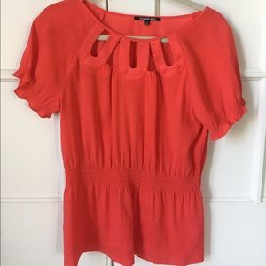 Coral peplum top